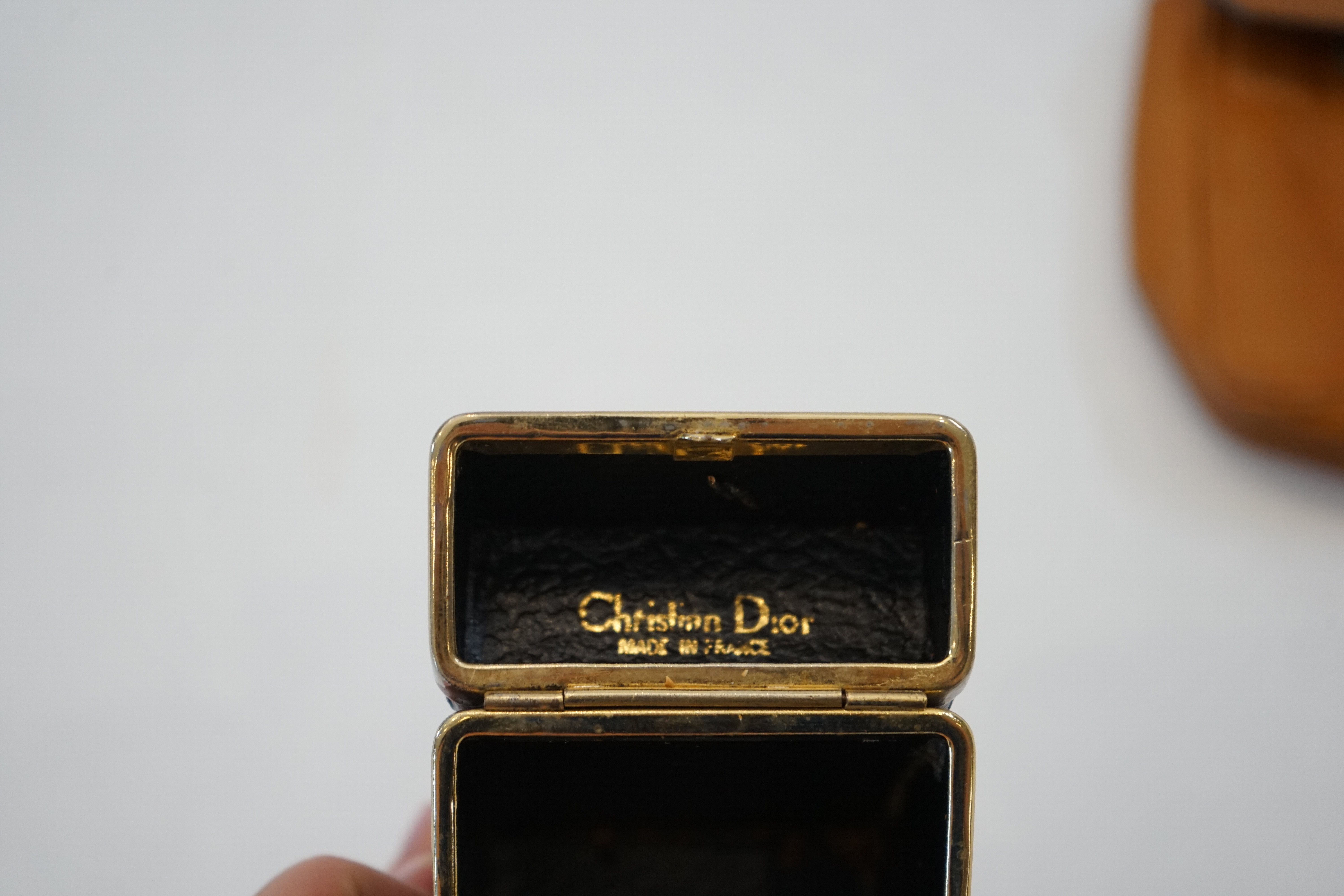 Four Vintage cigarette cases; Fendi, Gucci and two Dior